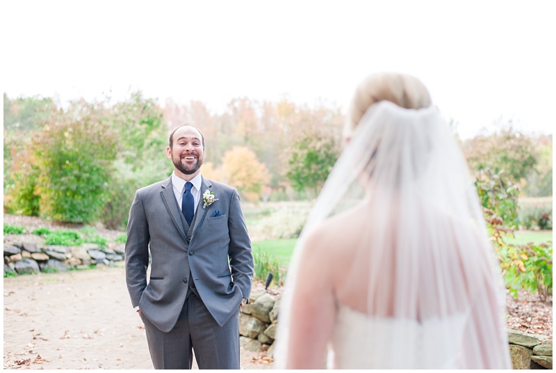 first look grooms reaction